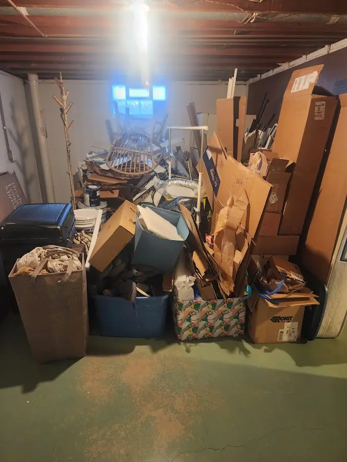 Roll-off dumpster container at job site for 4 Yard Dumpster Rental in Stallings